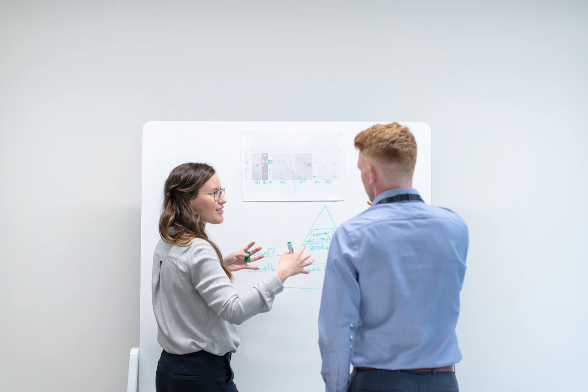 Professional team discussing a business proposal and project plan at a meeting table