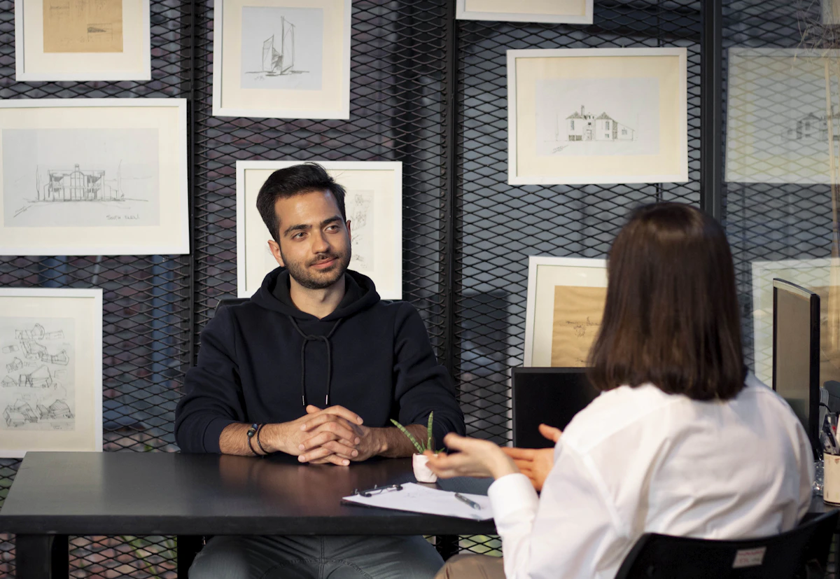 Professional interview conversation representing customer feedback and testimonial evidence