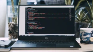 Laptop on a desk representing writing and editorial content production