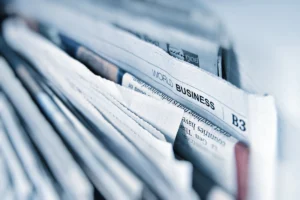 Newspapers and news publishing representing editorial discovery and news SEO
